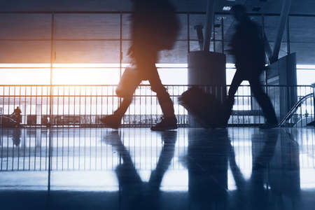 abstract airport background with walking commutersの写真素材