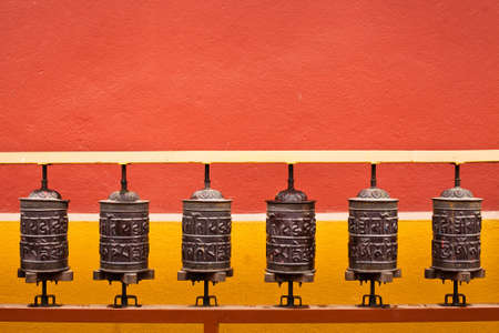 background about buddhism, prayer mills in buddhist monasteryの写真素材