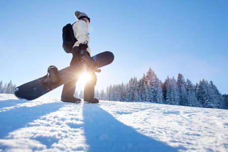 Snowboarding in winterの写真素材