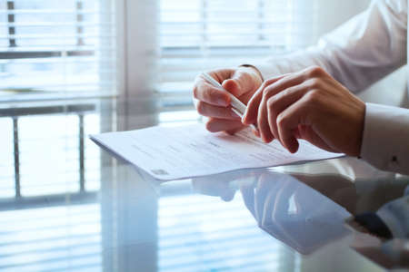 business man before signing contractの写真素材