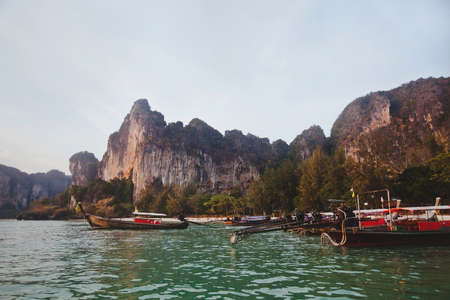 beautiful beach in Thailand with traditional boats, Krabiの写真素材