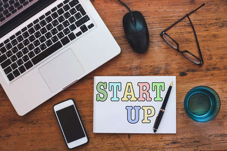 startup concept, colorful note written in notepadの写真素材