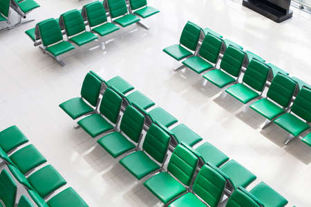 airport interior of waiting hall, top view of the chairsの写真素材