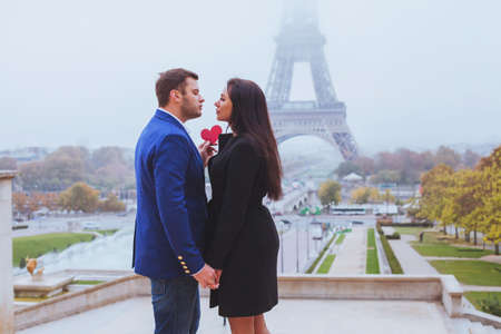Valentines day travel destination, couple in love near Eiffel Tower, Paris, Franceの写真素材