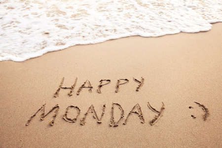 Happy monday, greeting card on the sandy beachの写真素材