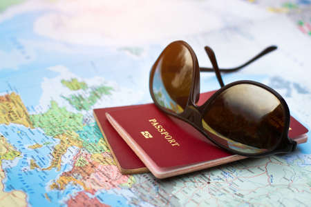 travel concept, two passports on the map of the world, holidays abroadの写真素材