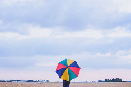 colorful umbrella, multicolored background, happiness conceptの写真素材