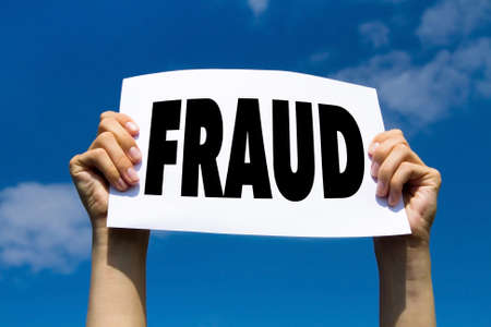 fraud sign, concept, hands holding paper signの写真素材
