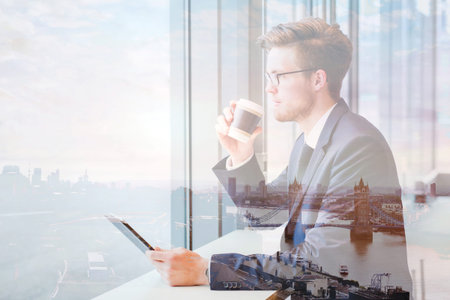 double exposure of business man and London skyline cityscapeの写真素材