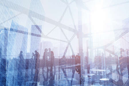 People walking in modern background, commuters double exposureの写真素材