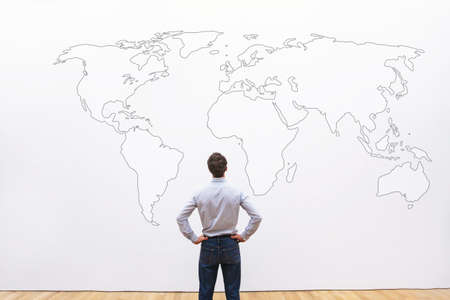 businessman looking at the world map, international career opportunity concept, business backgroundの写真素材