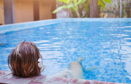 spa and wellness background, woman relaxing in luxurious thermal bath poolの写真素材