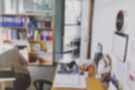 blurred office workplace backgroundの写真素材