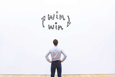 win-win concept, business man looking at win situation signの写真素材