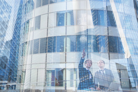 construction work and real estate double exposure, two architects discuss about new project