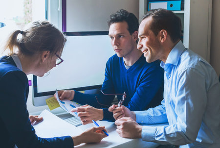 business team meeting concept, group of people working on documents analyze and computer in modern...