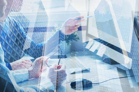 business and innovation technology, brainstorming or collaboration concept, double exposure of team working in modern officeの写真素材