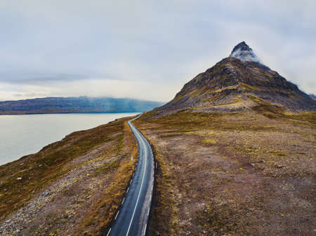scenic road in mountains, aerial landscape of beautiful west fjords in Icelandの写真素材