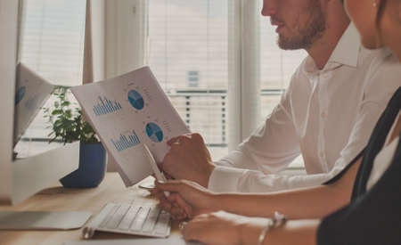 Business meeting, group of people analazyng financial charts. Strategy growth and development.の写真素材