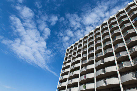 TOKYO, JAPAN - NOVEMBER 11, 2018: part of building in Odaiba island with blue sky and clouds in...