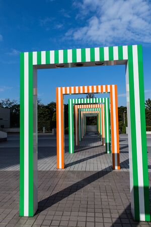 TOKYO, JAPAN - NOVEMBER 11, 2018: gate insalliation in Odaiba island with blue sky and clouds in backgroundのeditorial素材