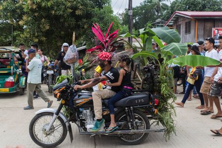 EL NIDO, PALAWAN PHILIPPINES - JANUARY 21, 2018 : Annual january festival fiesta in El Nido with people from every village wearing hand made costumes and dancingのeditorial素材