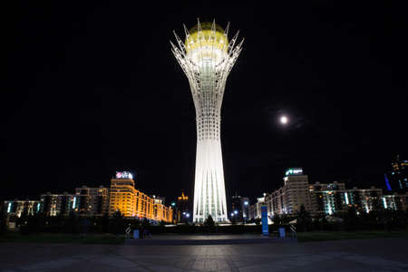 KAZAKHSTAN, NUR-SULTAN - AUGUST 12, 2017: bayterek observation tower and capital monument in the night timeのeditorial素材