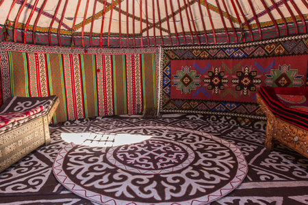 kazakh traditional yurt nomadic house interiour made of natural materials with bright elements