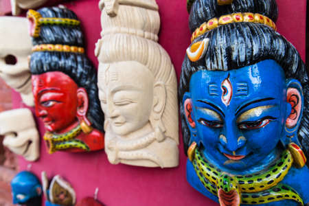 BHAKTAPUR NEPAL - APRIL 12, 2019: handmade buddhist wooden masks in small craft workers village near Chandu Narayan Templeのeditorial素材