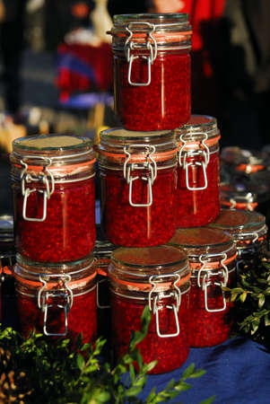 Raspberry jam jars arranged for saleの写真素材