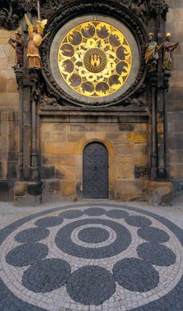 The Astronomical Clock, built in to one side of the Old Town Hall Tower, with a bit of adjucent pawement in frontの写真素材
