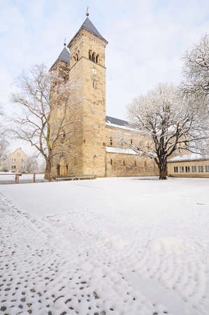 Church in Bad Klosterlausnitz under fresh snow, decorated for Christmas; the church was built in 11th century in Romanic styleの写真素材
