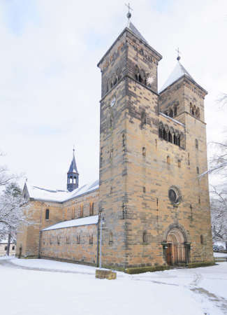 Church in Bad Klosterlausnitz under fresh snow, decorated for Christmas; the church was built in 11th century in Romanic styleの写真素材