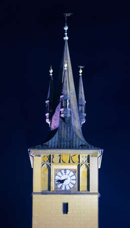 A closeup on Church of Virgin Maria Before Tyn in Old Town Square in Prague. The church has been illuminated from a rock concert stage underneath. の写真素材