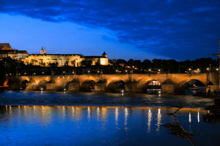 Evening view of Charles Bridge over Vltava river from Novotneho Lavka, Prague, Czechの写真素材