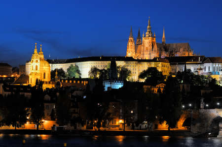 Evening view of  Prague Castle and Charles Bridge over Vltava river from Novotneho Lavka, Prague, Czechの写真素材