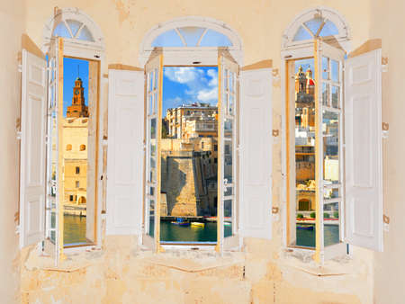 Bay window with view over Valetta harbor to Cospicua の写真素材
