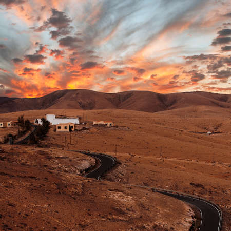Sunset over a road at Fuerteventura, Canary islans, Spainの写真素材