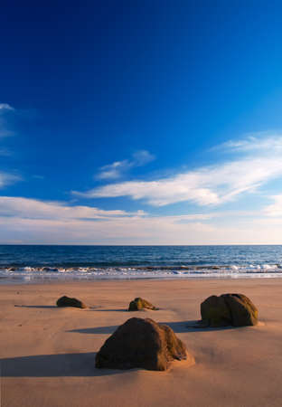 Stones by the sea on a beach of Fuerteventura, Canary islands, Spainの写真素材