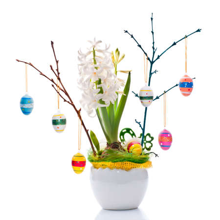 Flower arrangement with Easter eggs and white pearl hyacinthの写真素材