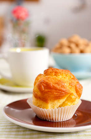 Tasty muffin and a cup of hot teaの写真素材