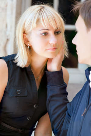 blond lady and a man are having a date date の写真素材
