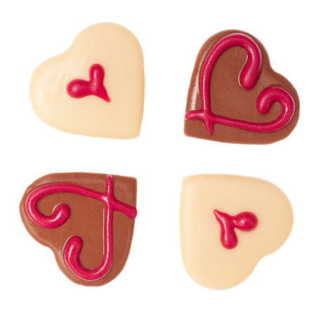 Heart-shaped hocolate pralines pn white backgroundの写真素材