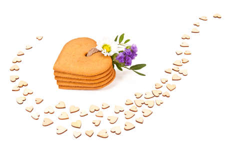 Gingerbread cookies in a shape of a heart isolated on whiteの写真素材