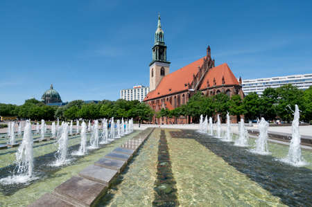 Fountains on Alexanderplatz in front of St  Maryのeditorial素材