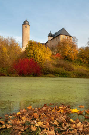 Pond with autumn leaves in rural Turingia, Germany の写真素材