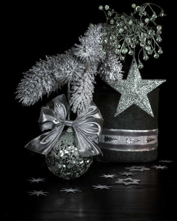 Silver Christmas decorations, candle on a table の写真素材