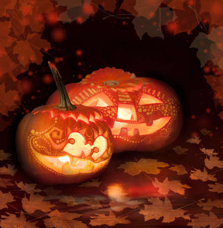 Two Halloween pumpkins on black abstract backgroundの写真素材
