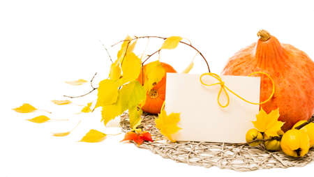 Autumn corner composition with pumpkins and leaves, greeting card with text spaceの写真素材