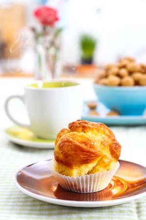 Tasty muffin and a cup of hot tea の写真素材